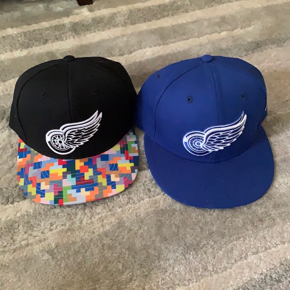 Two Red Wings hats